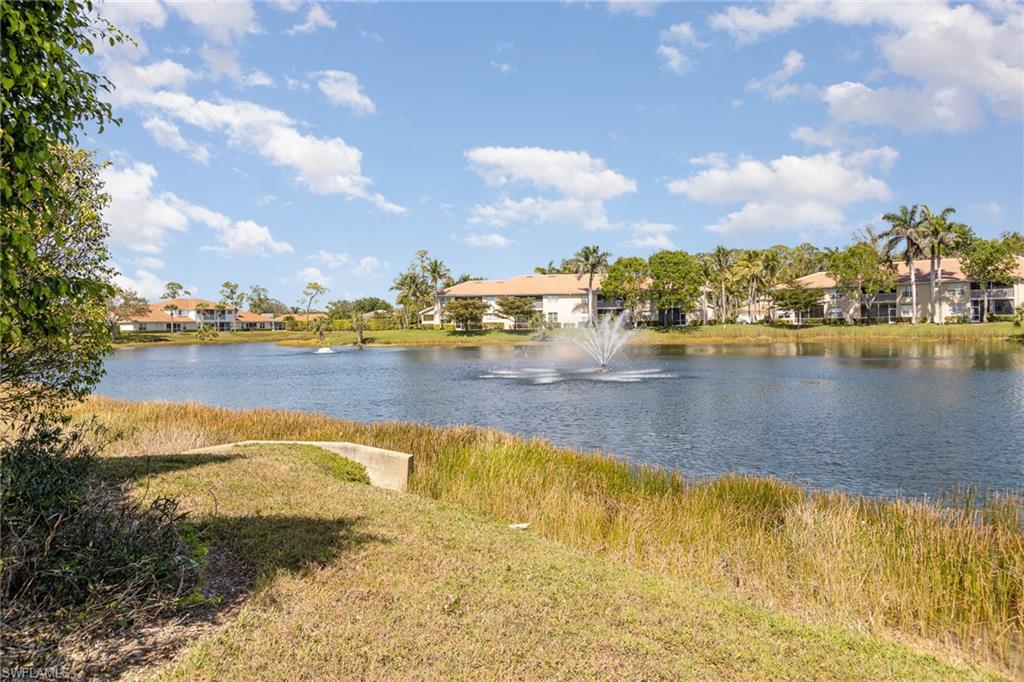 367 Dover Place, Unit 1006 Naples, FL 34104 - Photo 26 of 31 a view of an ocean and beach