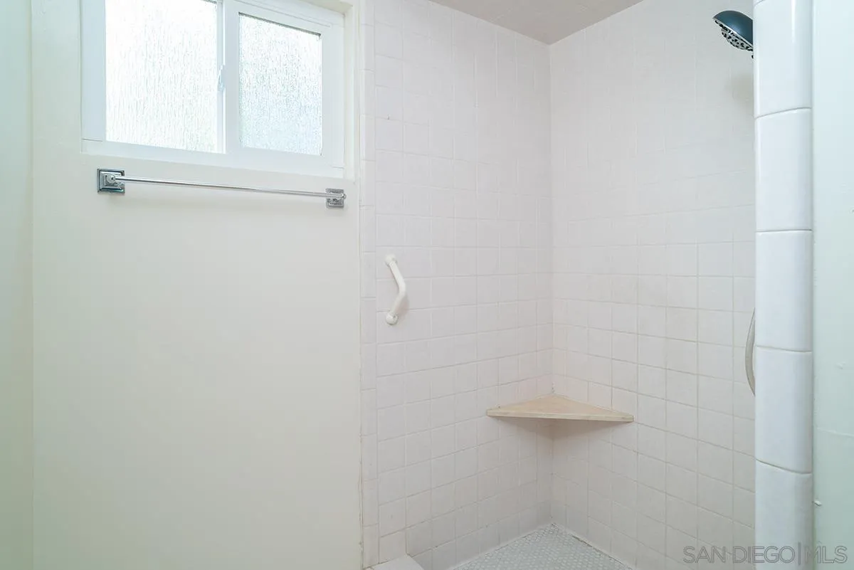 6777 West Lilac Road Bonsall, CA 92003 - Photo 25 of 36 a bathroom with a shower