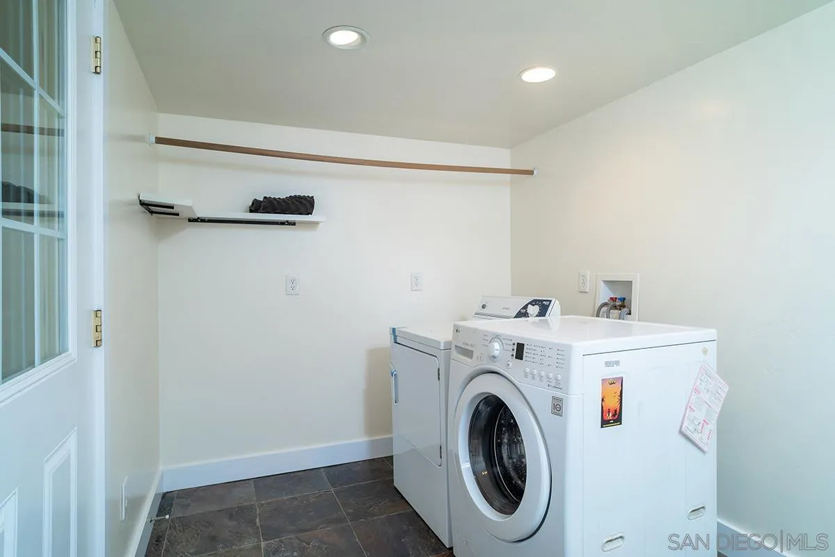 6777 West Lilac Road Bonsall, CA 92003 - Photo 29 of 36 a utility room with dryer and washer