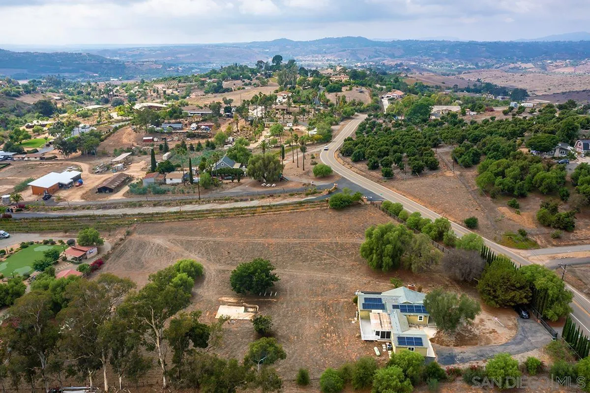 6777 West Lilac Road Bonsall, CA 92003 - Photo 5 of 36 an aerial view of multiple house