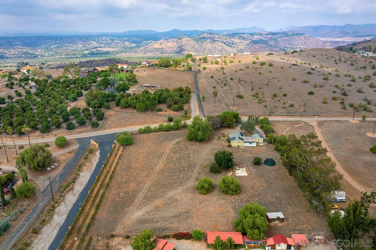 6777 West Lilac Road Bonsall, CA 92003 - Photo 6 of 36 a view of a city with mountains in the background