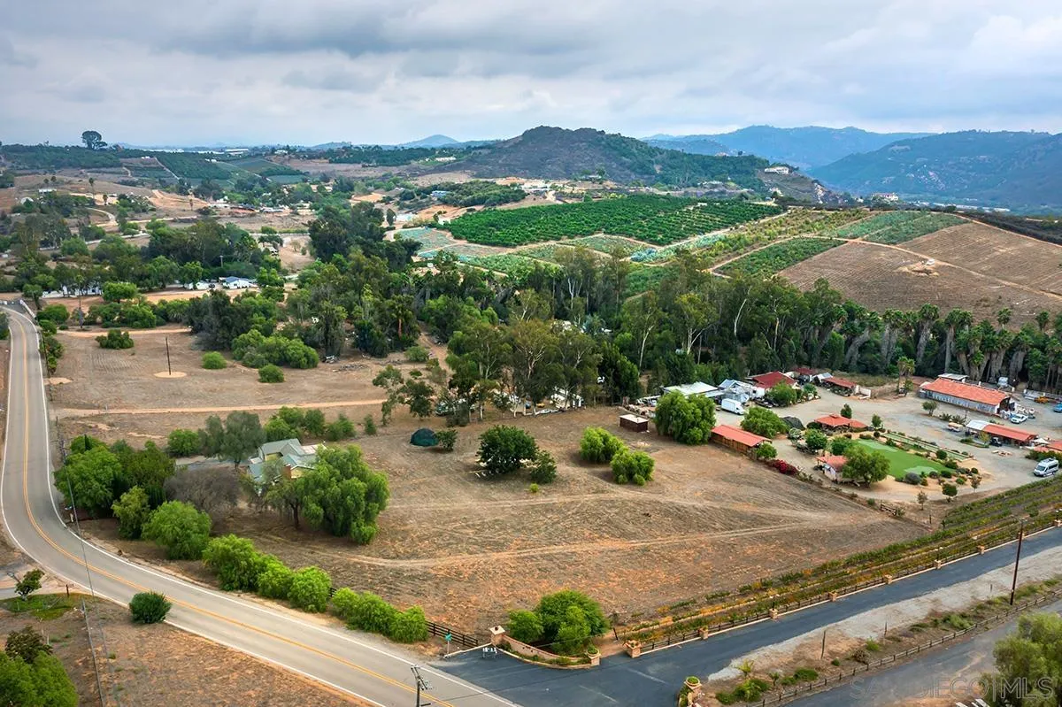 6777 West Lilac Road Bonsall, CA 92003 - Photo 7 of 36 an aerial view of a house having yard