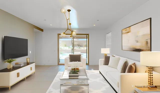 a living room with furniture and a flat screen tv