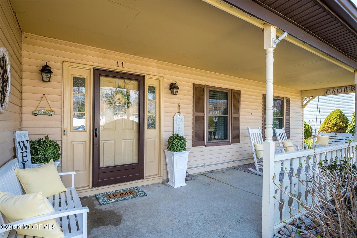 11 Quailtree Lane Howell, NJ 07731 - Photo 2 of 52 a view of a porch with seating space