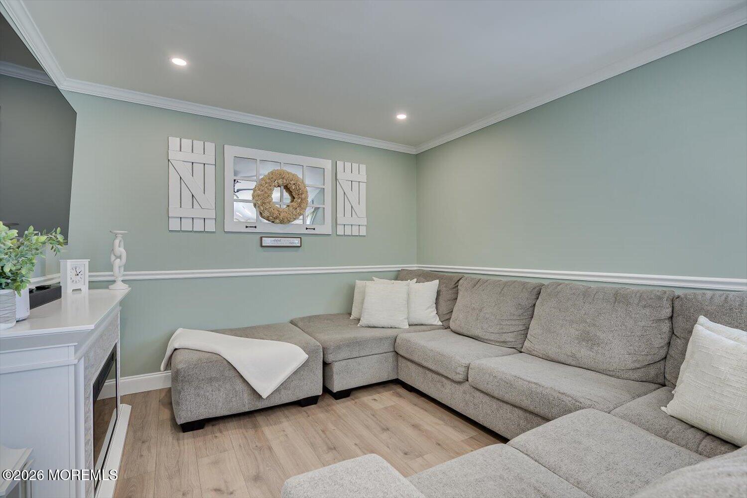 11 Quailtree Lane Howell, NJ 07731 - Photo 23 of 52 a living room with furniture and a night stand