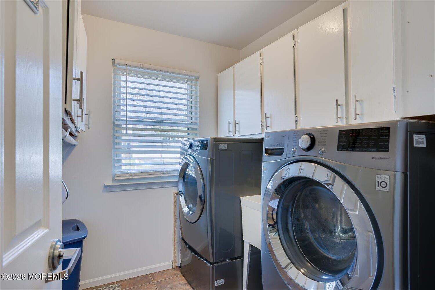 11 Quailtree Lane Howell, NJ 07731 - Photo 27 of 52 a utility room with dryer and washer