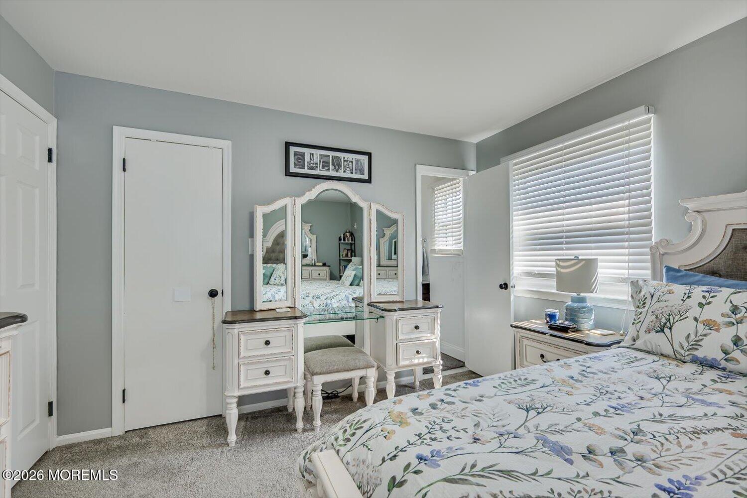 11 Quailtree Lane Howell, NJ 07731 - Photo 29 of 52 a bedroom with a bed and a view of kitchen