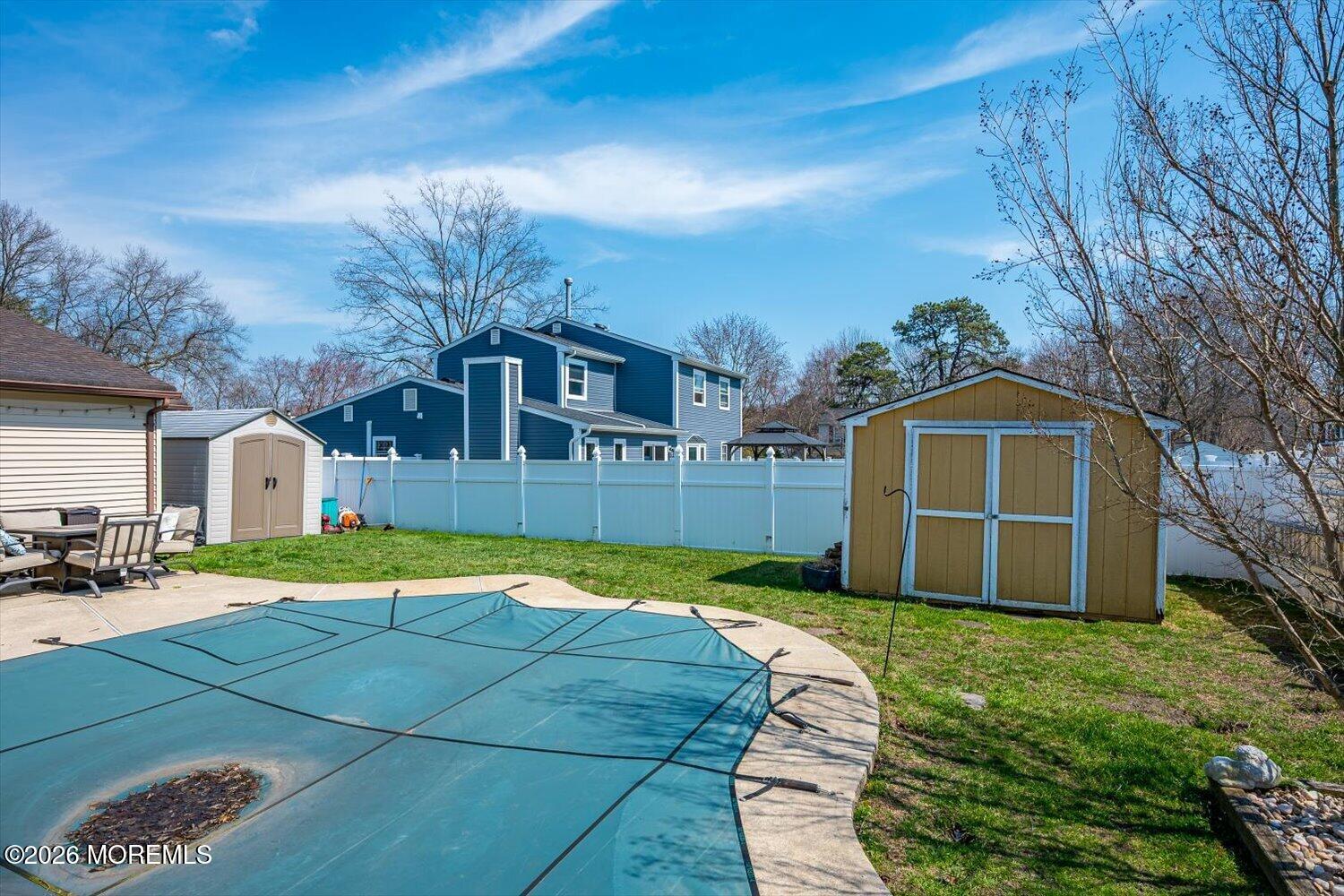11 Quailtree Lane Howell, NJ 07731 - Photo 45 of 52 a yellow house with a yard