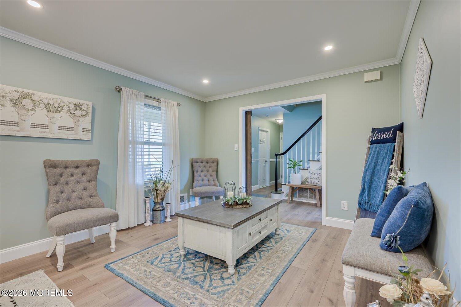 11 Quailtree Lane Howell, NJ 07731 - Photo 9 of 52 a living room with furniture and wooden floor