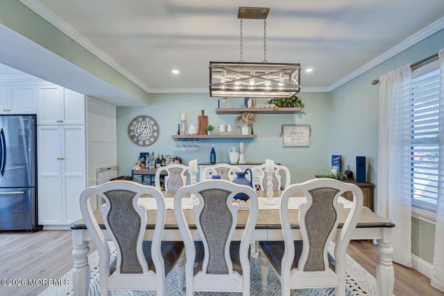 11 Quailtree Lane Howell, NJ 07731 - Photo 10 of 52 a view of a dining room with furniture a kitchen and chandelier