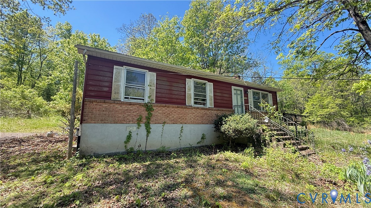 1386 Springwood Road Fincastle, VA 24090 - Photo 1 of 10 front view of a house with a yard