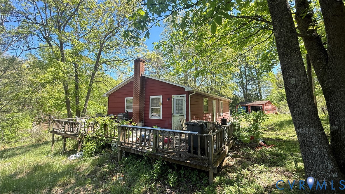 1386 Springwood Road Fincastle, VA 24090 - Photo 8 of 10 a house view with a garden space