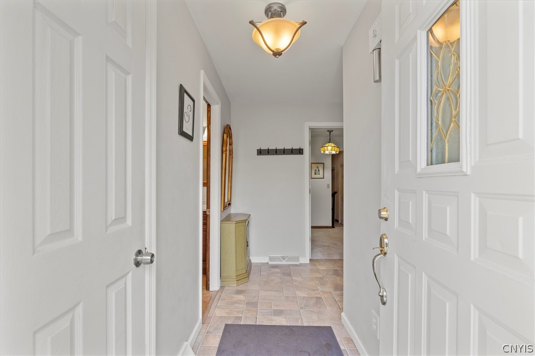 8826 Karlen Road Lee, NY 13440 - Photo 13 of 50 Welcoming entryway with neutral tones, ceramic til