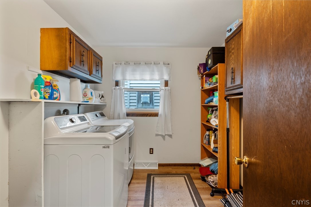 8826 Karlen Road Lee, NY 13440 - Photo 23 of 50 Main level laundry with built-in storage keeps eve
