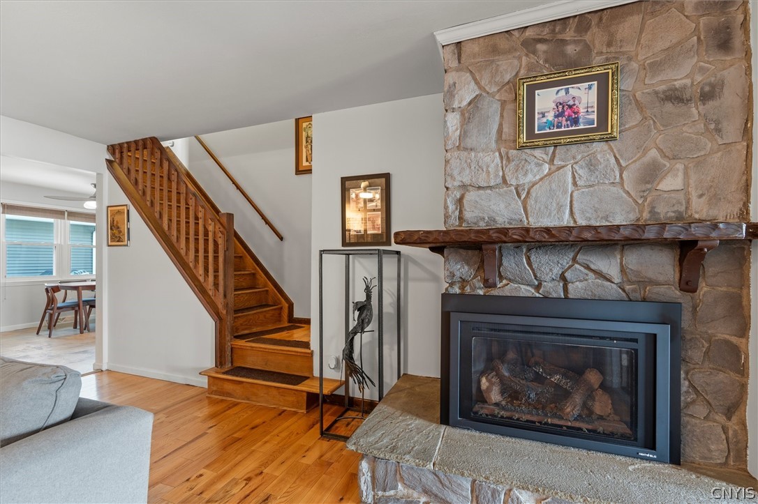 8826 Karlen Road Lee, NY 13440 - Photo 31 of 50 Warm stone fireplace anchors this inviting space.