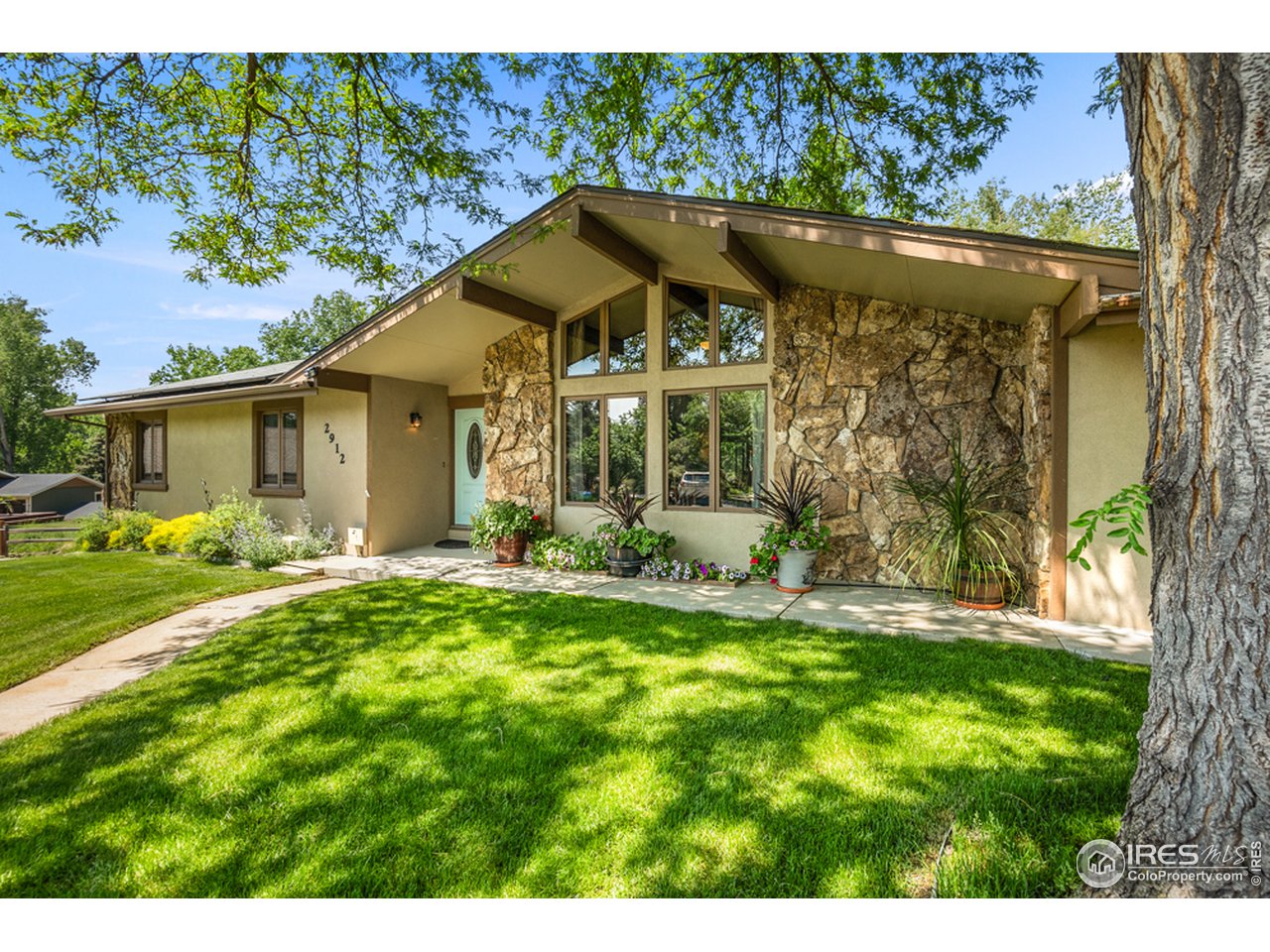 2912 Shore Road Fort Collins, CO 80524 - Photo 1 of 40 Natural Stone and Stucco exterior