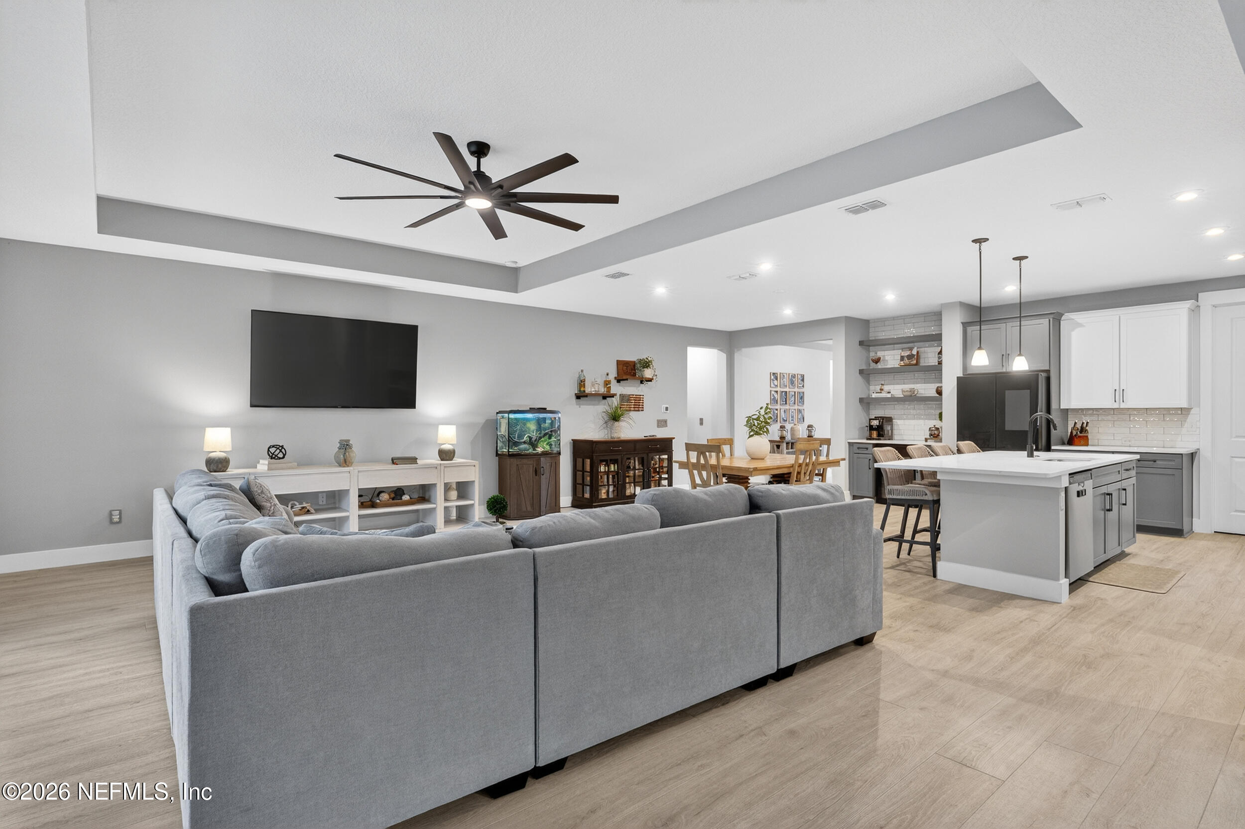 4028 Little Bit Court Middleburg, FL 32068 - Photo 19 of 47 a living room with furniture and a flat screen tv