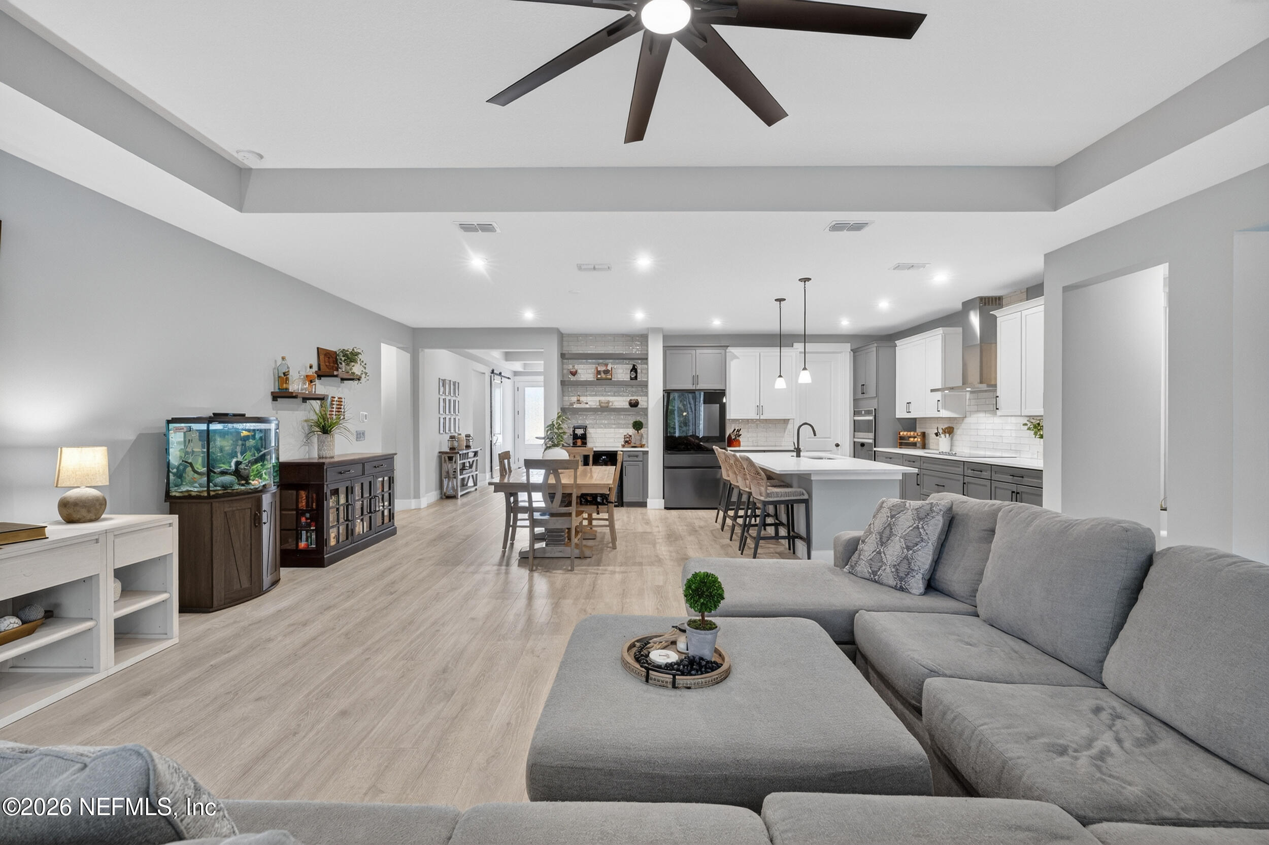4028 Little Bit Court Middleburg, FL 32068 - Photo 21 of 47 a living room with furniture kitchen and a table