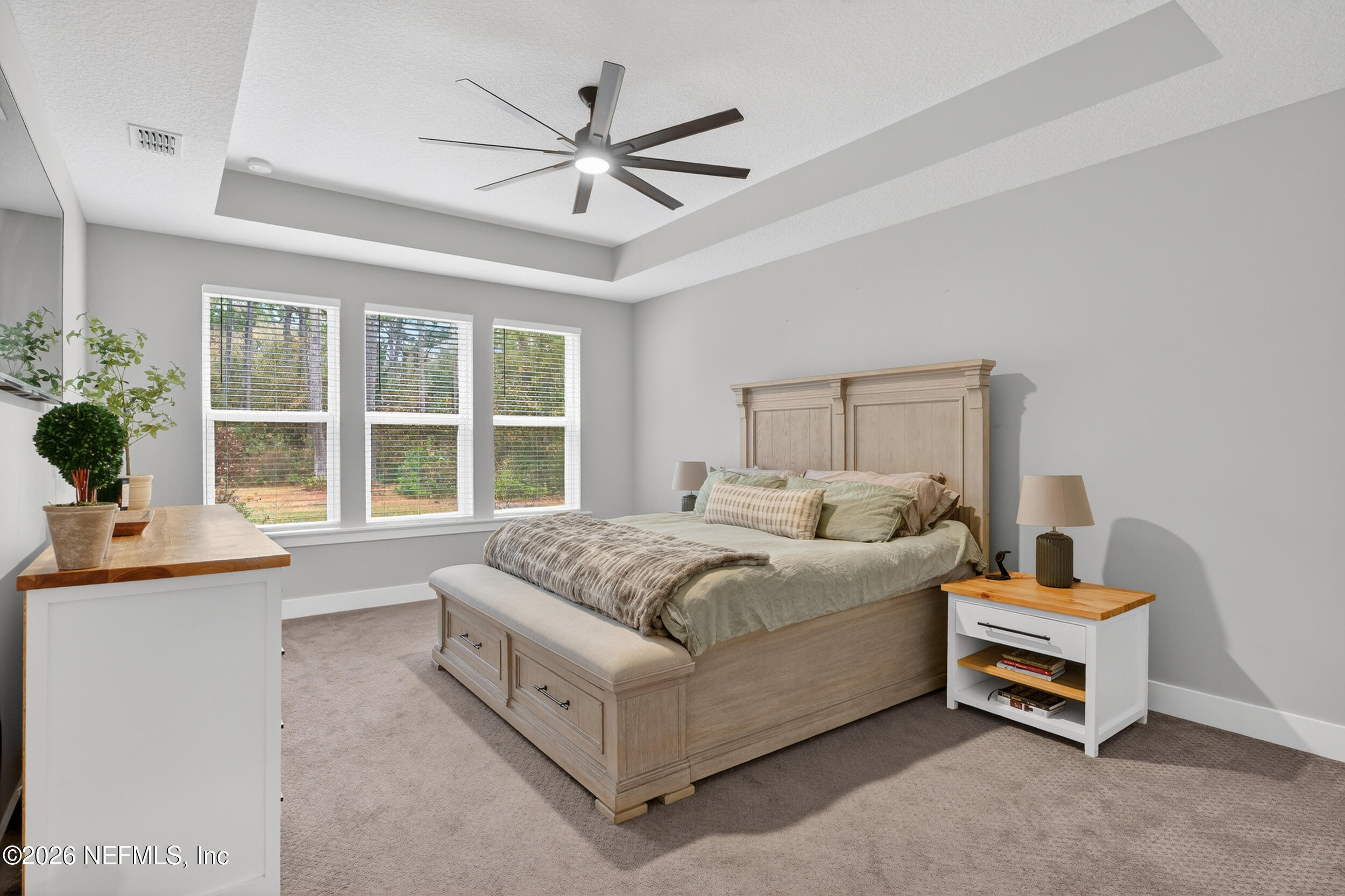 4028 Little Bit Court Middleburg, FL 32068 - Photo 22 of 47 a living room with furniture and a large window