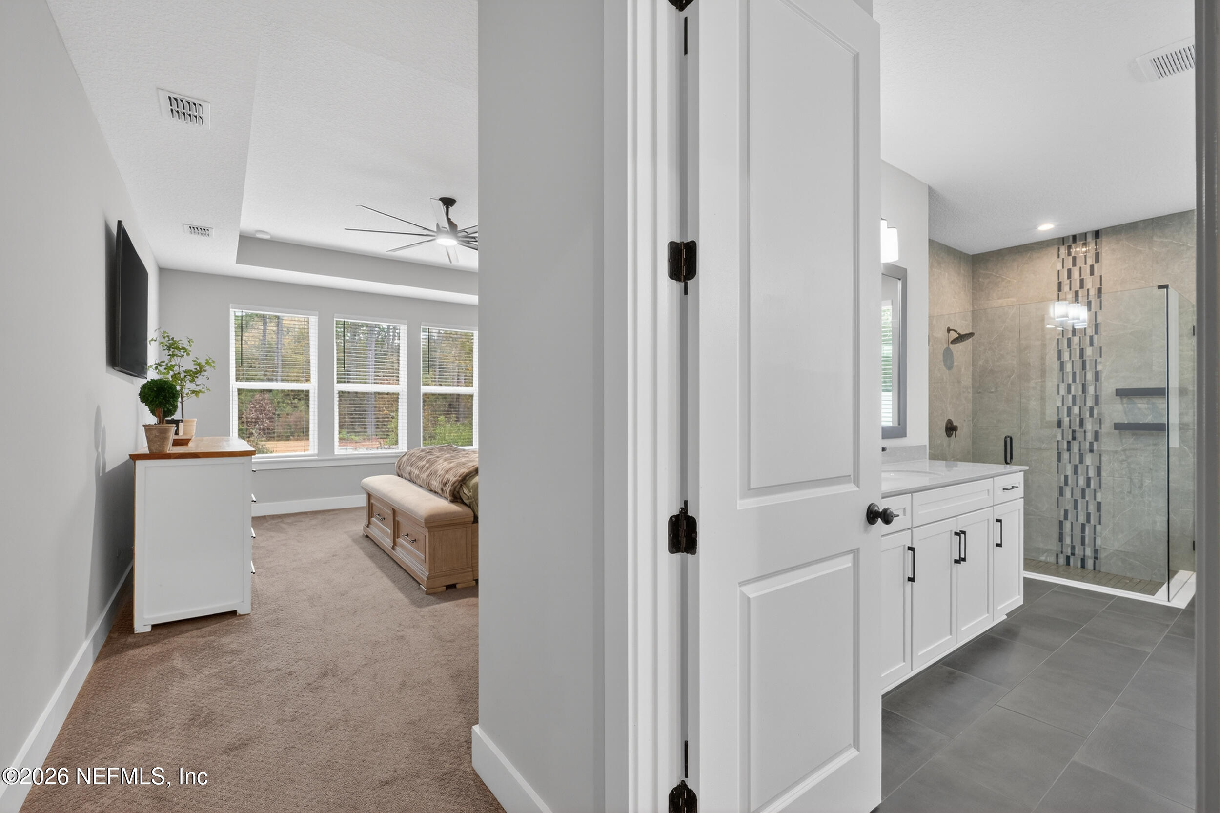 4028 Little Bit Court Middleburg, FL 32068 - Photo 24 of 47 a room with white cabinets and window