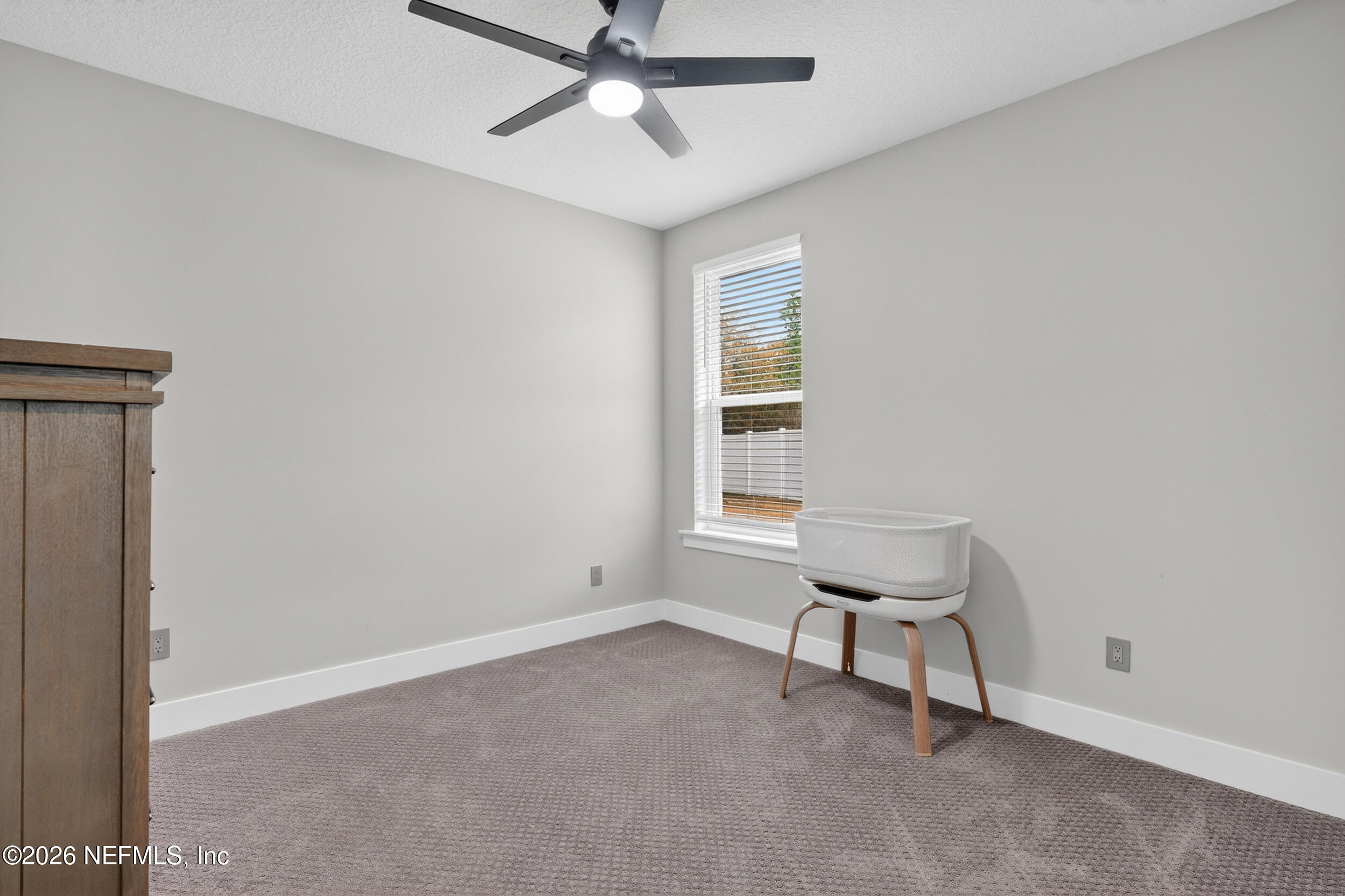 4028 Little Bit Court Middleburg, FL 32068 - Photo 31 of 47 a view of room with window and ceiling fan