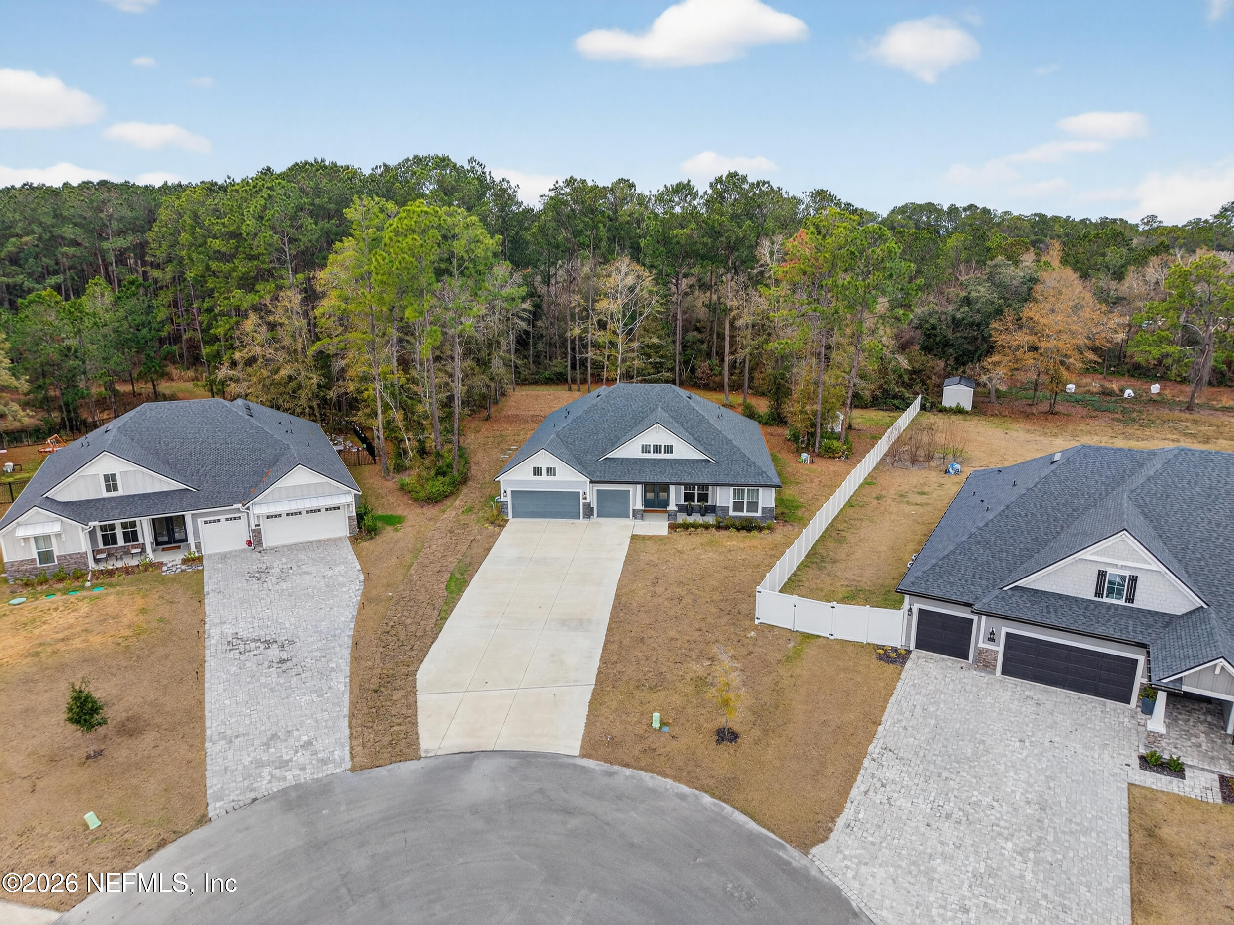 4028 Little Bit Court Middleburg, FL 32068 - Photo 44 of 47 an aerial view of a house with a garden