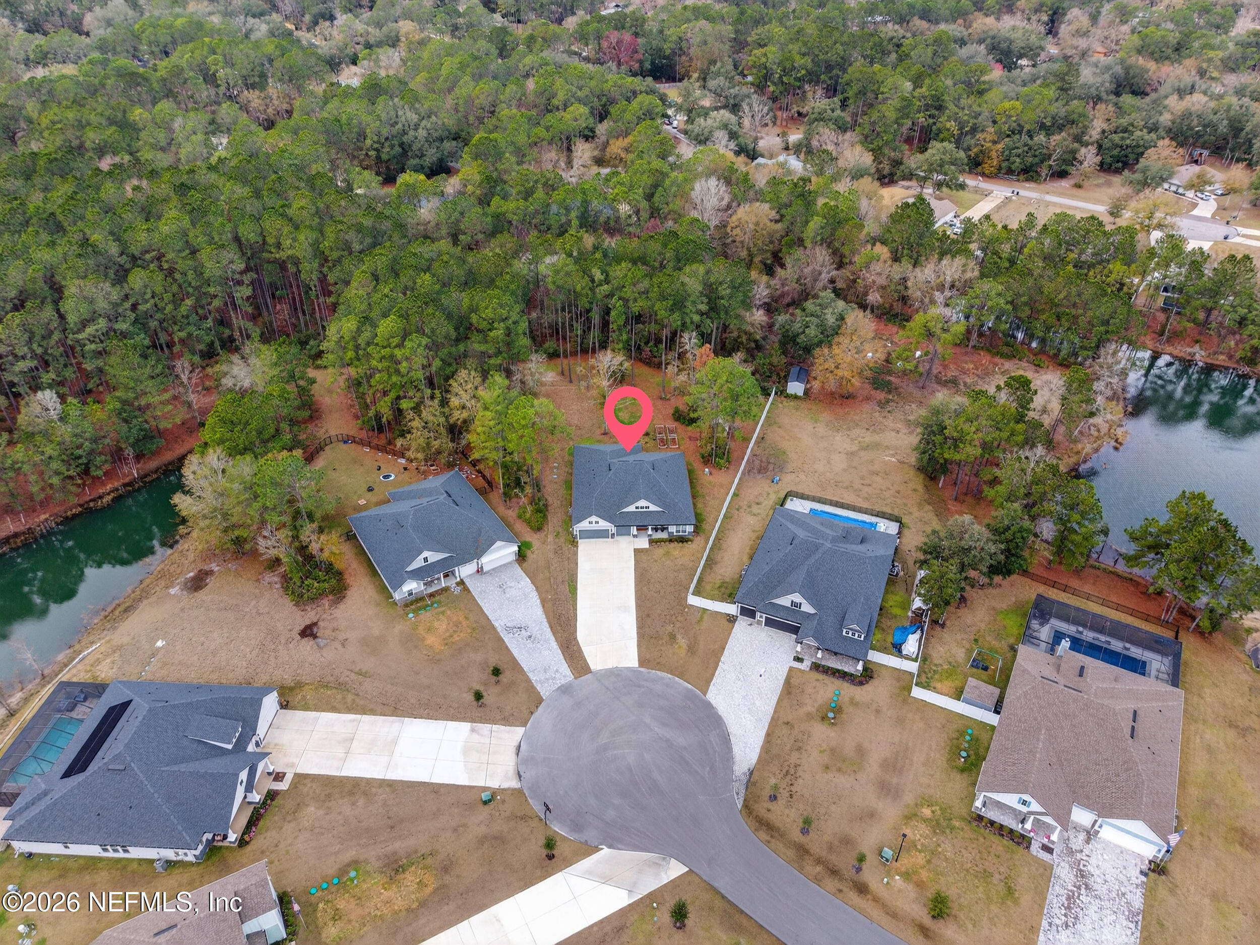 4028 Little Bit Court Middleburg, FL 32068 - Photo 46 of 47 an aerial view of a house with garden space and street view