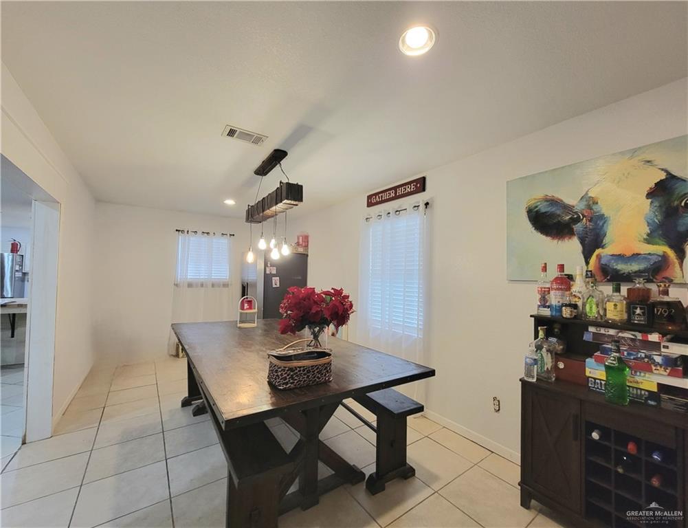 206 South Arroyo Boulevard Rio Hondo, TX 78583 - Photo 12 of 42 Dining area with recessed lighting and light tile patterned floors