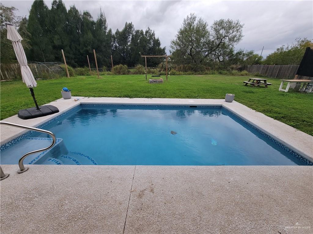 206 South Arroyo Boulevard Rio Hondo, TX 78583 - Photo 32 of 42 View of pool featuring a patio area