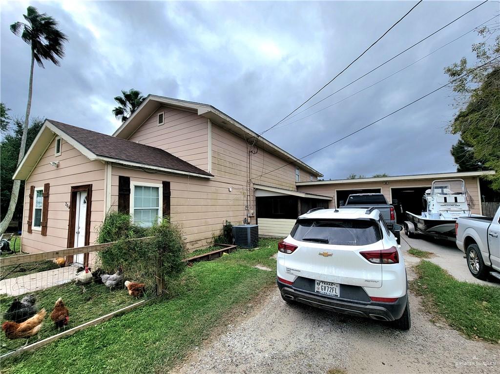 206 South Arroyo Boulevard Rio Hondo, TX 78583 - Photo 36 of 42 View of front of property with a garage and driveway