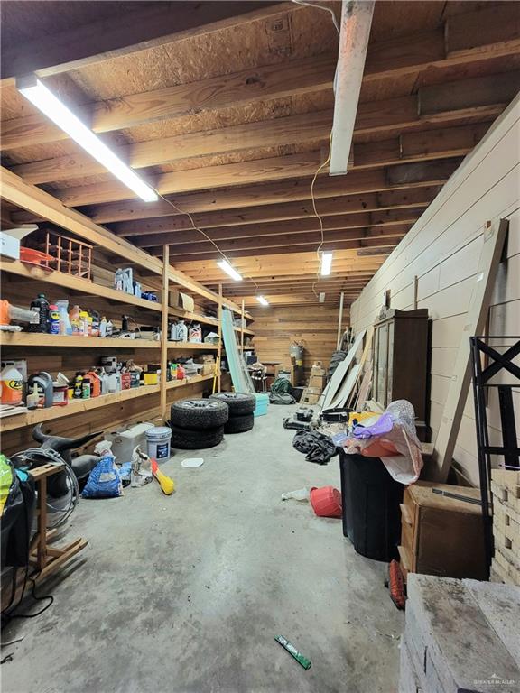 206 South Arroyo Boulevard Rio Hondo, TX 78583 - Photo 38 of 42 behind garage is a large workshop featuring wooden walls