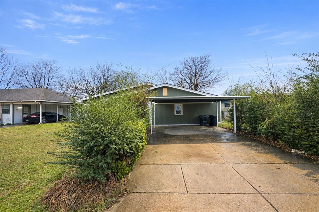 4604 Reed Street Fort Worth, TX 76119 - Photo 1 of 1 a view of a yard in front of house