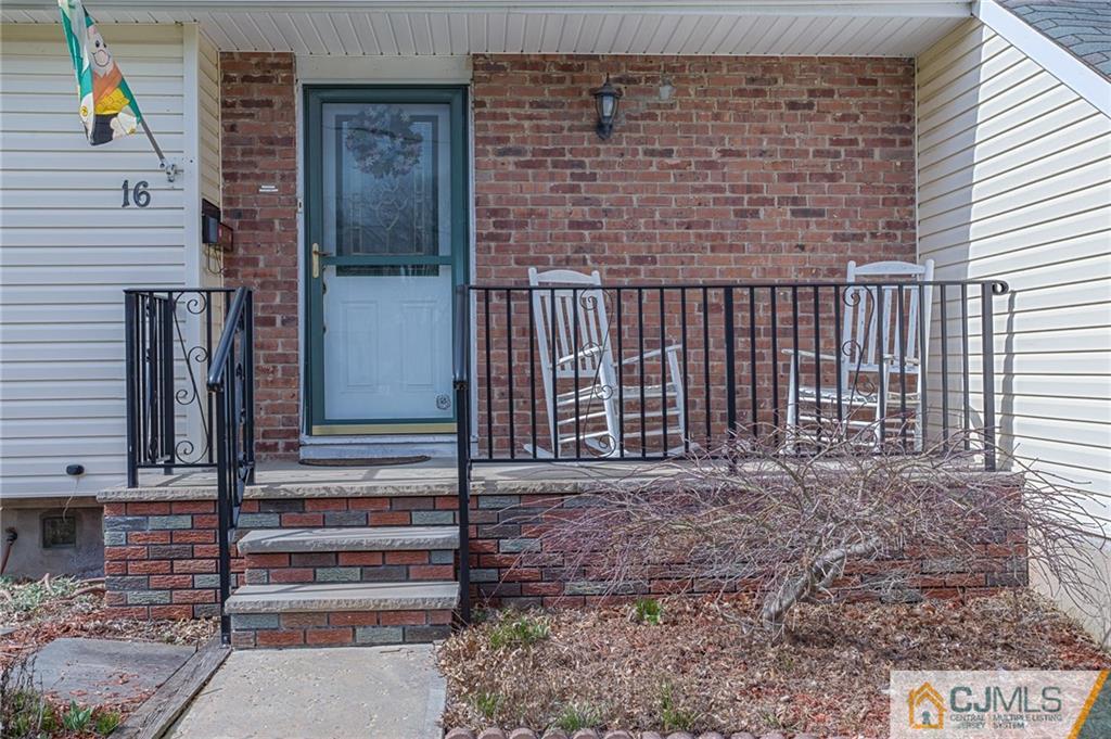 16 Fulton Road Somerset, NJ 08873 - Photo 2 of 25 a front view of a house with a stairs