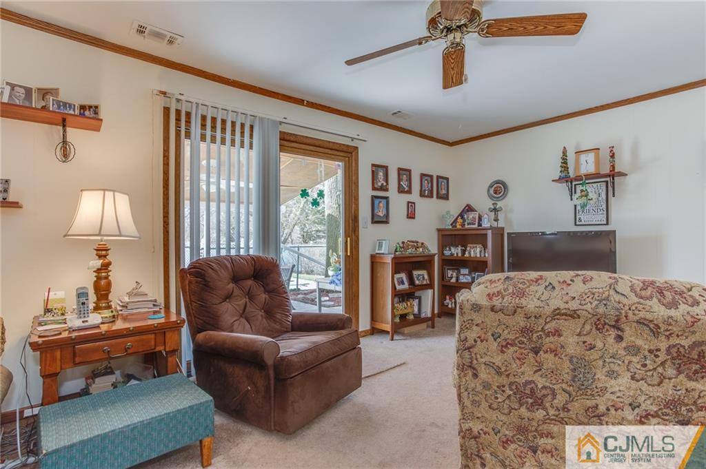 16 Fulton Road Somerset, NJ 08873 - Photo 11 of 25 a living room with furniture and a window