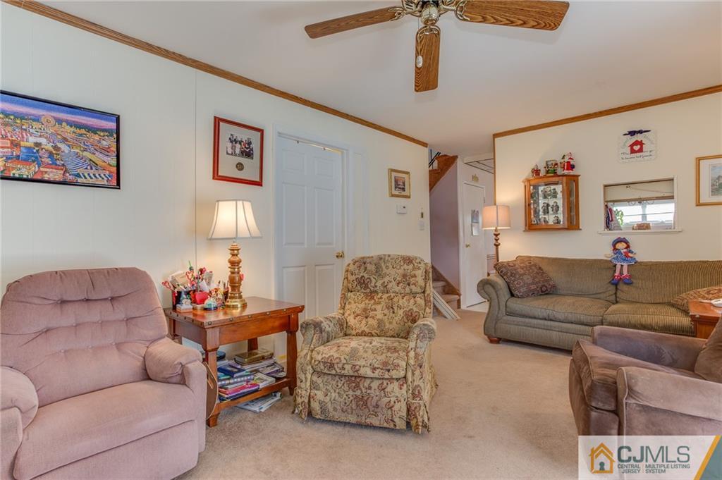 16 Fulton Road Somerset, NJ 08873 - Photo 12 of 25 a living room with furniture and a couch