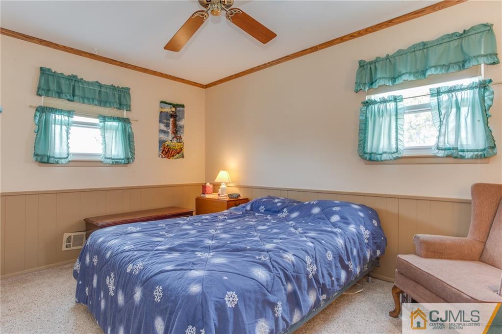 16 Fulton Road Somerset, NJ 08873 - Photo 17 of 25 a bedroom with a bed and window