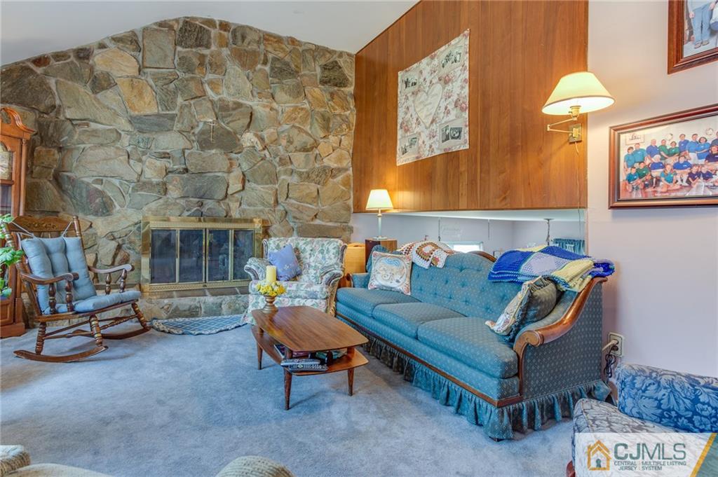 16 Fulton Road Somerset, NJ 08873 - Photo 6 of 25 a living room with furniture and a fireplace