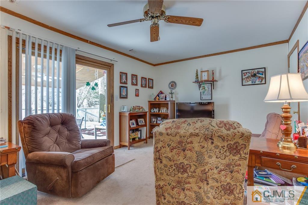 16 Fulton Road Somerset, NJ 08873 - Photo 10 of 25 a living room with furniture and a window