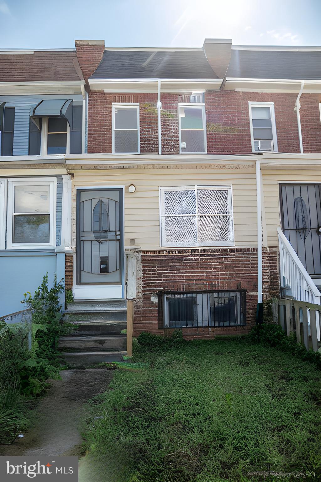 3035 West Belvedere Avenue Baltimore, MD 21215 - Photo 2 of 49 a view of house with a yard