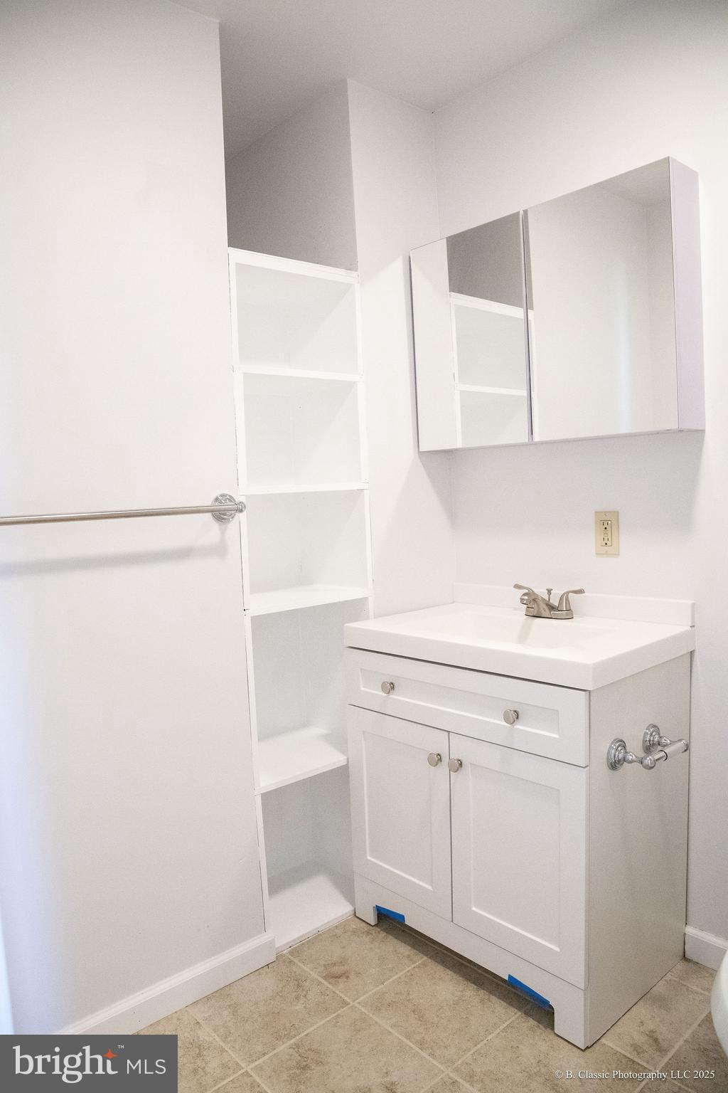 3035 West Belvedere Avenue Baltimore, MD 21215 - Photo 22 of 49 a view of cabinets with white cabinetry