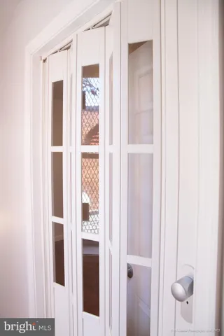 a view of a bathroom with a glass door