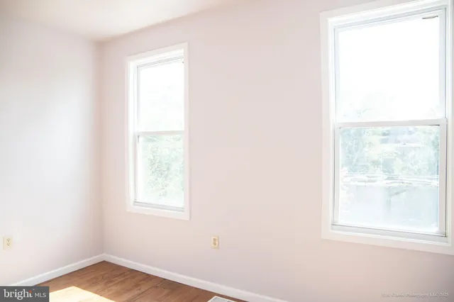 a view of a window in an empty room