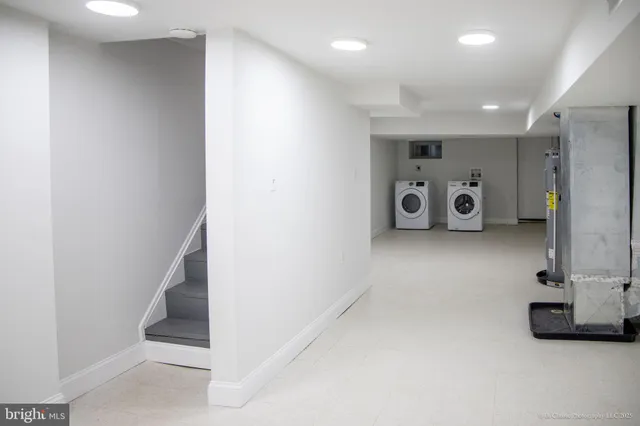 a view of a hallway with seating area
