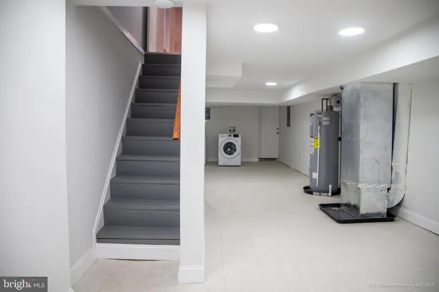 a view of a hallway with staircase