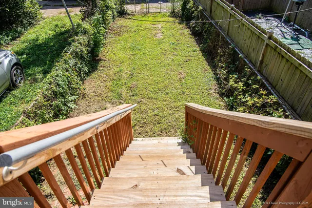 a view of balcony with wooden floor