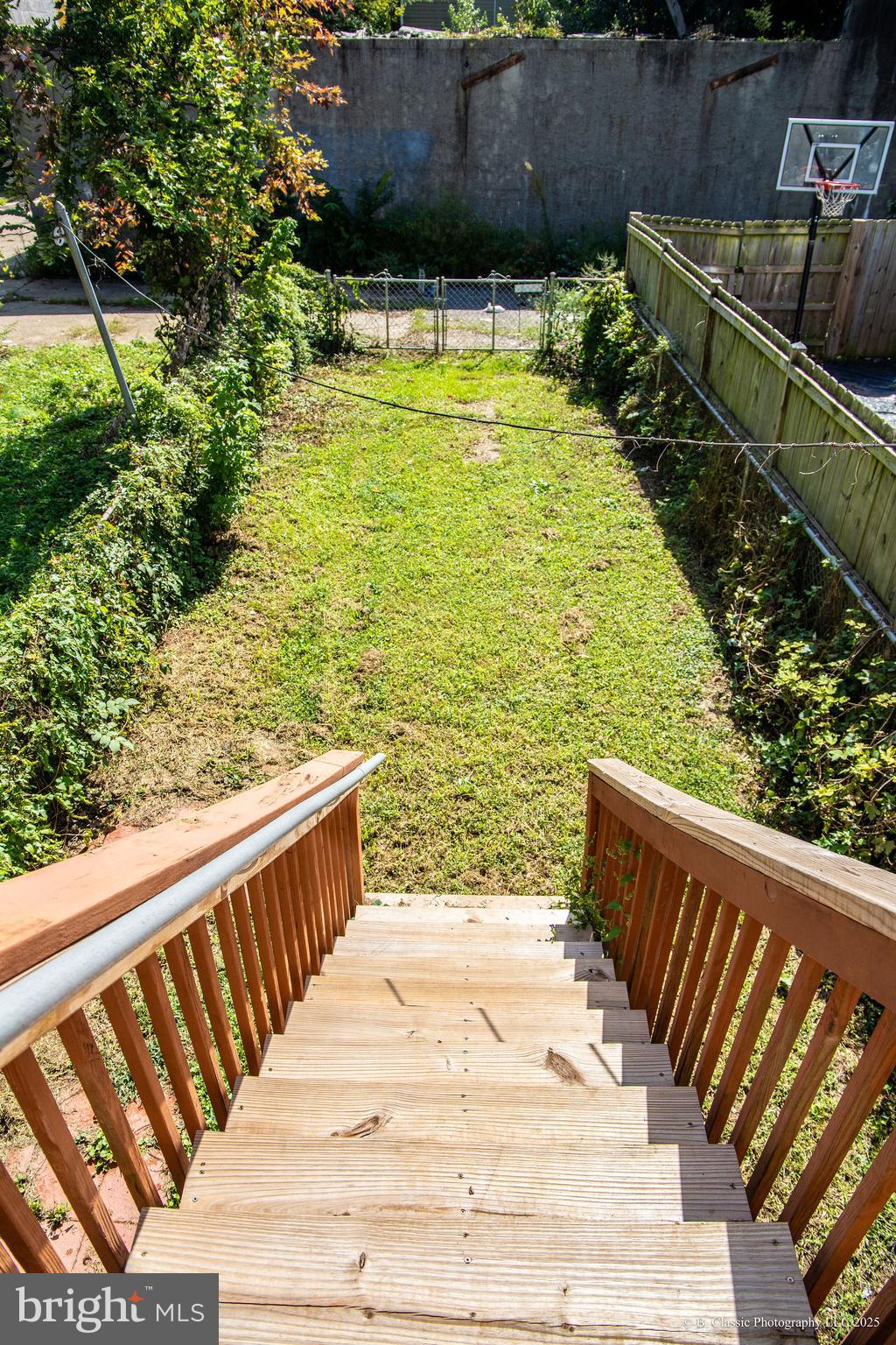 3035 West Belvedere Avenue Baltimore, MD 21215 - Photo 44 of 49 a view of a swimming pool with a patio and plants