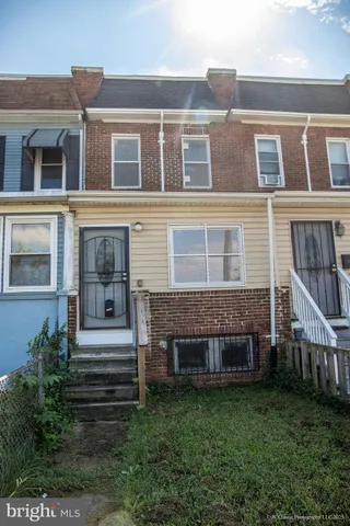 a front view of house with yard
