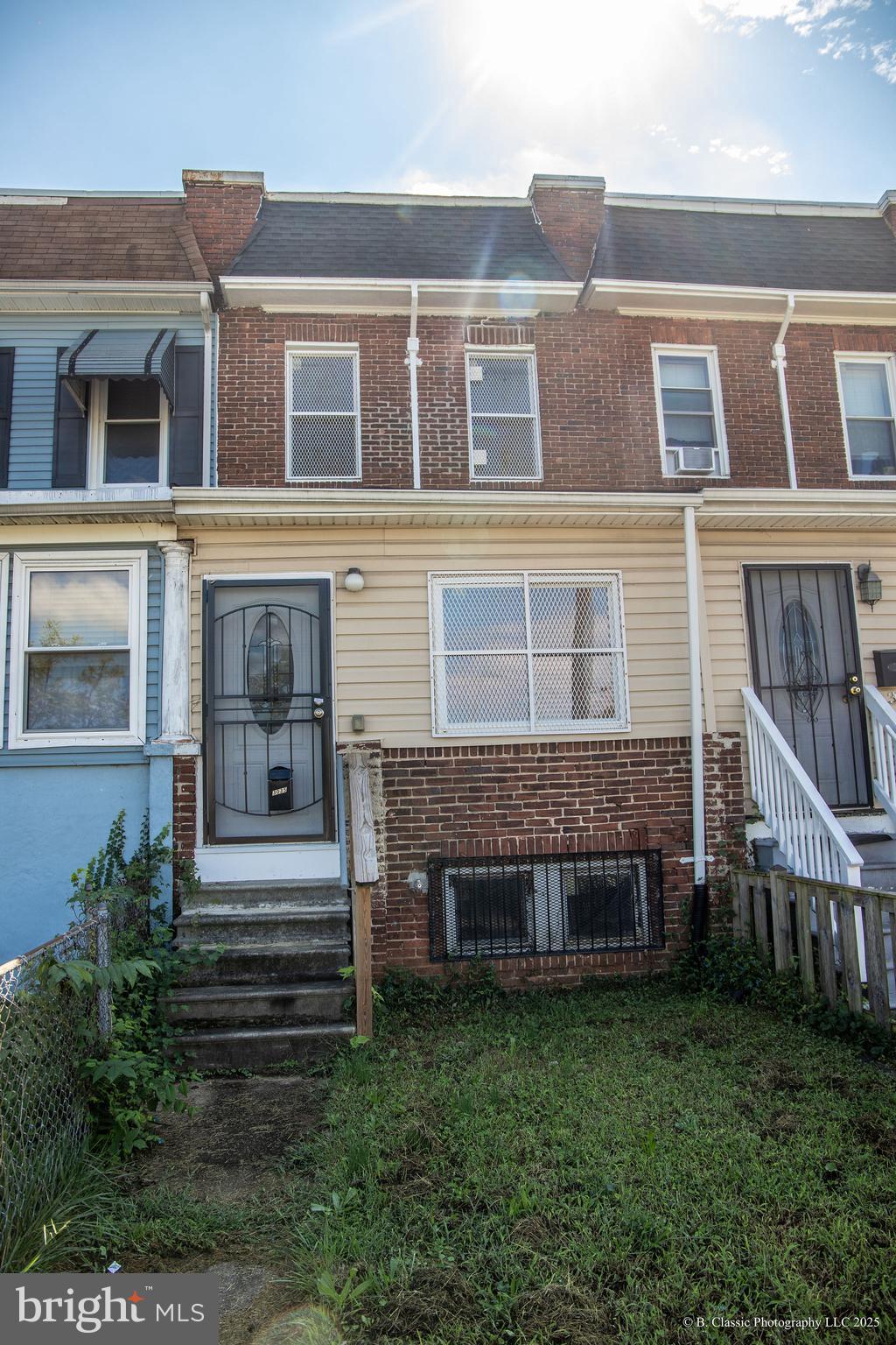 3035 West Belvedere Avenue Baltimore, MD 21215 - Photo 7 of 49 a front view of house with yard
