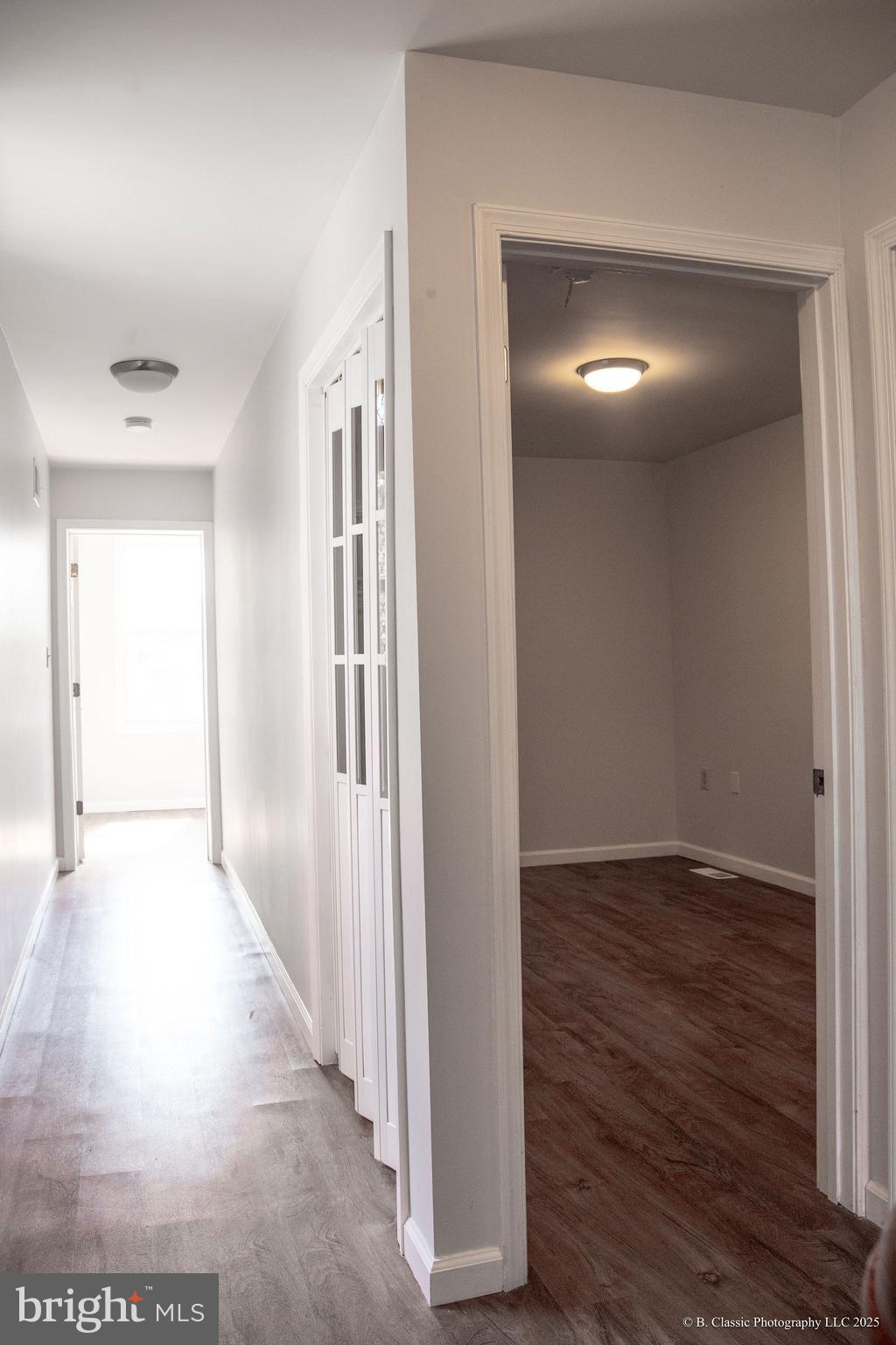 3035 West Belvedere Avenue Baltimore, MD 21215 - Photo 8 of 49 a view of hallway with wooden floor