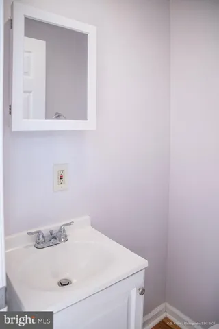 a bathroom with a sink and a vanity